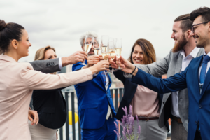 Professionals celebrating at a corporate party